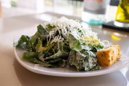 Plate of caesar salad from Sal and Mookie's Restaurant in Jackson, Mississippi.